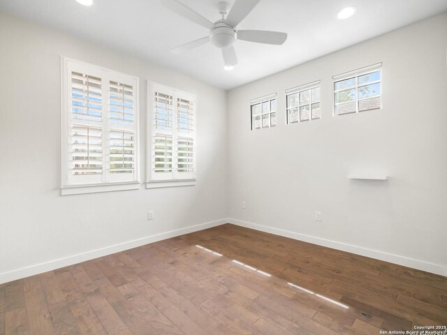 338 E Olmos, San Antonio, TX 78212 - spare room with recessed lighting, ceiling fan, and hardwood / wood-style floors