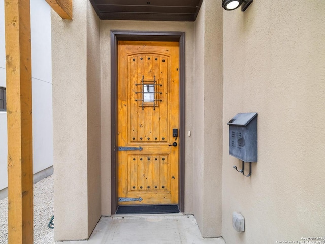 338 E Olmos, San Antonio, TX 78212 - view of exterior entry featuring stucco siding