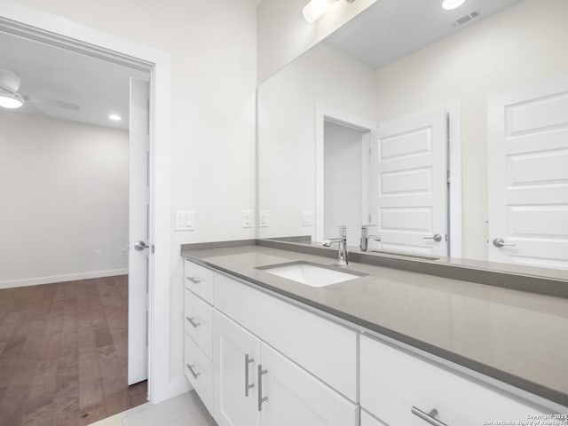 338 E Olmos, San Antonio, TX 78212 - bathroom with vanity, wood finished floors, recessed lighting, and a ceiling fan