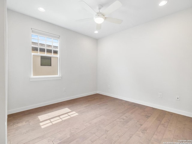 338 E Olmos, San Antonio, TX 78212 - spare room with wood-type flooring, ceiling fan, and recessed lighting
