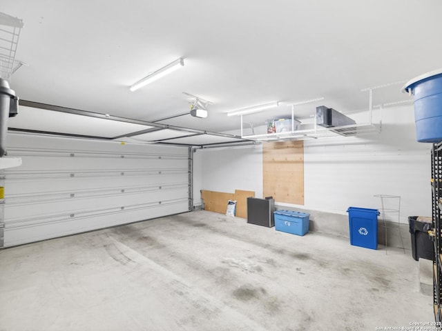 338 E Olmos, San Antonio, TX 78212 - garage with a garage door opener