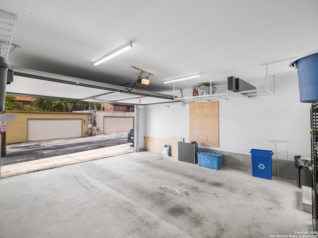 338 E Olmos, San Antonio, TX 78212 - garage with a garage door opener