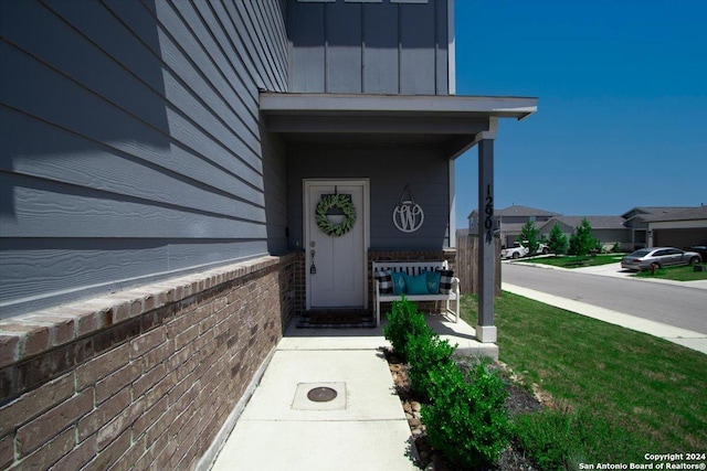 12904 Liam Ct, Saint Hedwig, TX 78152 - view of exterior entry with board and batten siding
