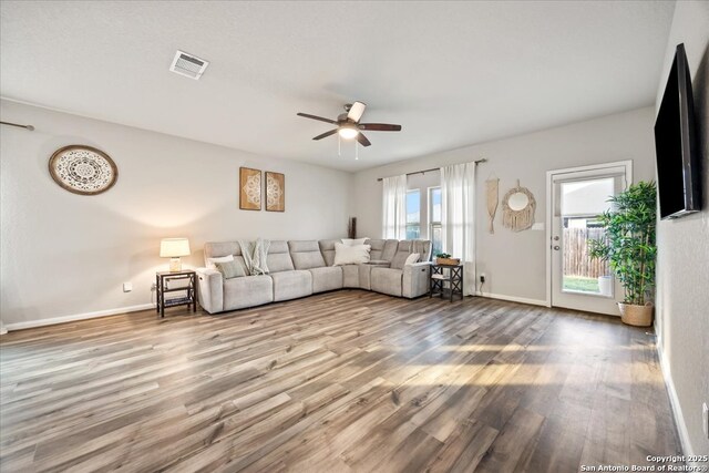 3016 Muscat, Schertz, TX 78154 - living area featuring a ceiling fan and wood finished floors