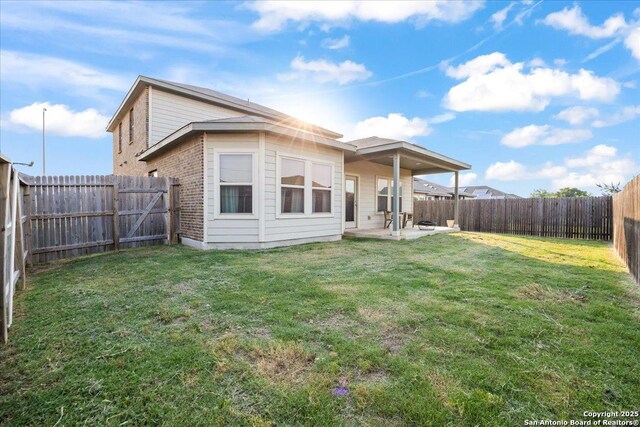 3016 Muscat, Schertz, TX 78154 - rear view of house featuring a patio area, a fenced backyard, and brick siding