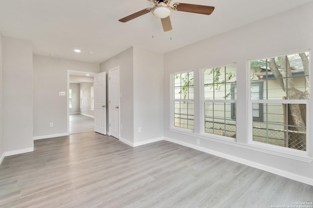 2738 Ravina, San Antonio, TX 78222 - spare room featuring wood finished floors, recessed lighting, and ceiling fan