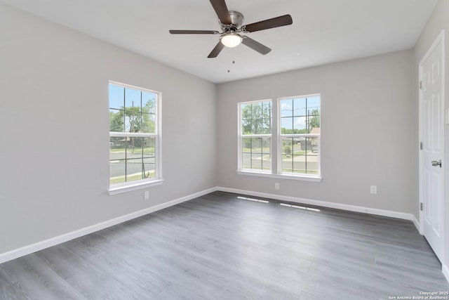2738 Ravina, San Antonio, TX 78222 - spare room featuring a ceiling fan and wood finished floors