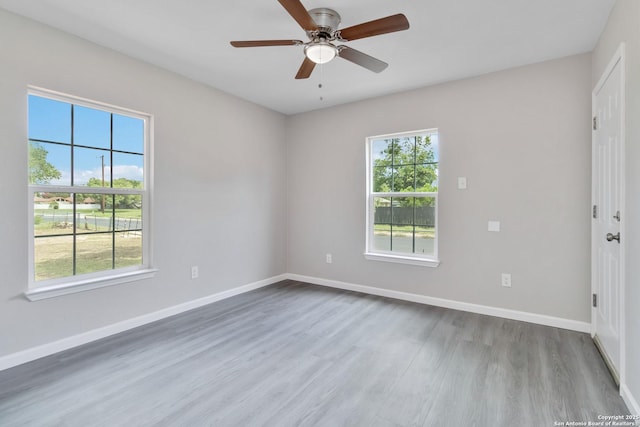 2738 Ravina, San Antonio, TX 78222 - spare room with wood finished floors and a ceiling fan