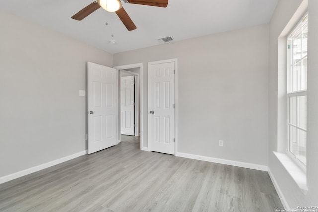 2738 Ravina, San Antonio, TX 78222 - unfurnished bedroom with light wood-style flooring and a ceiling fan