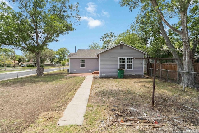2738 Ravina, San Antonio, TX 78222 - back of house with a fenced backyard and a patio