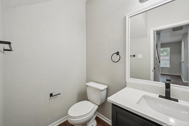 12107 Dawson Cir, San Antonio, TX 78253 - bathroom with vanity, wood finished floors, and a textured wall