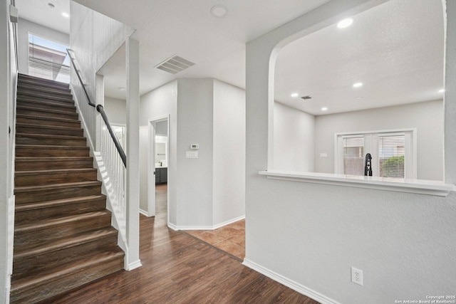 12107 Dawson Cir, San Antonio, TX 78253 - foyer entrance featuring stairs, wood finished floors, plenty of natural light, recessed lighting, and arched walkways