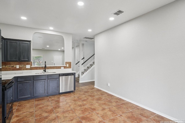12107 Dawson Cir, San Antonio, TX 78253 - kitchen with dishwasher, light countertops, recessed lighting, arched walkways, and a peninsula