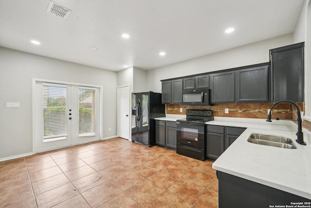 12107 Dawson Cir, San Antonio, TX 78253 - kitchen featuring black appliances, tasteful backsplash, french doors, recessed lighting, and light tile patterned floors