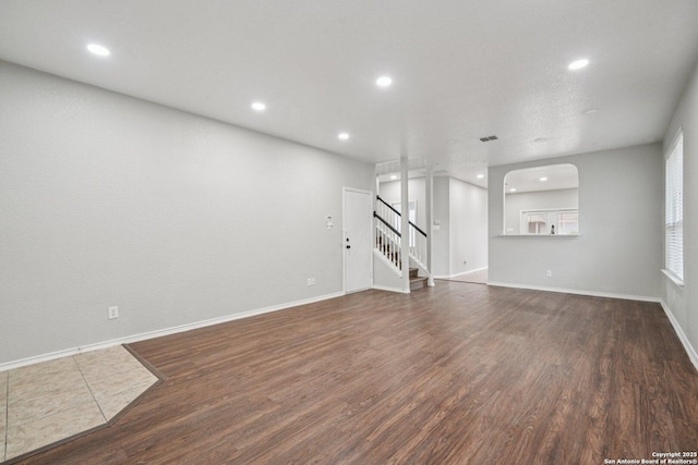 12107 Dawson Cir, San Antonio, TX 78253 - spare room with wood finished floors, stairs, and recessed lighting