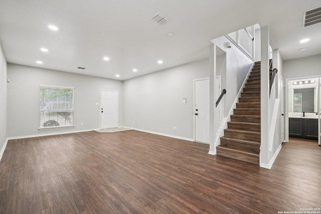 12107 Dawson Cir, San Antonio, TX 78253 - unfurnished living room featuring dark wood finished floors, stairs, and recessed lighting