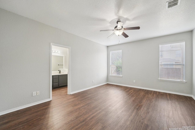 12107 Dawson Cir, San Antonio, TX 78253 - spare room with a ceiling fan, dark wood-type flooring, and a textured ceiling