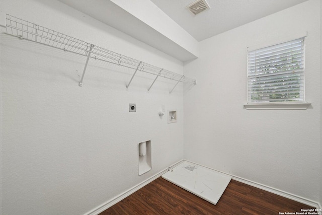 12107 Dawson Cir, San Antonio, TX 78253 - laundry area with hookup for a gas dryer, hookup for a washing machine, electric dryer hookup, and wood finished floors