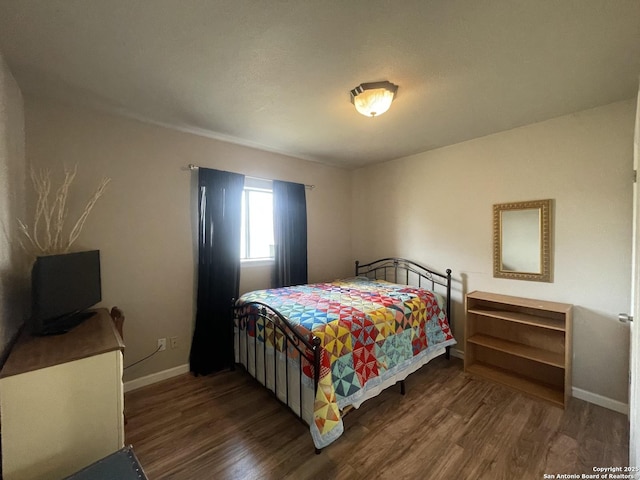 123 Turkey Dr, Harper, TX 78631 - bedroom with wood finished floors and baseboards