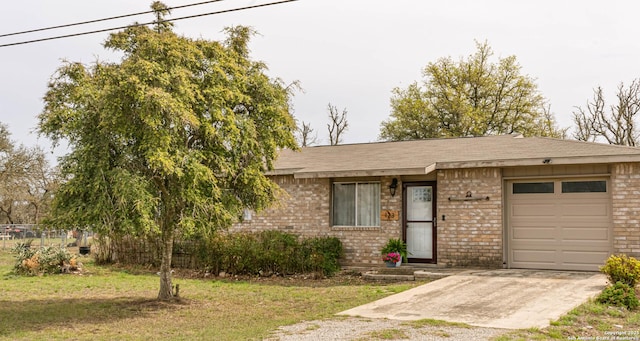 123 Turkey Dr, Harper, TX 78631 - ranch-style home with brick siding, driveway, an attached garage, and roof with shingles