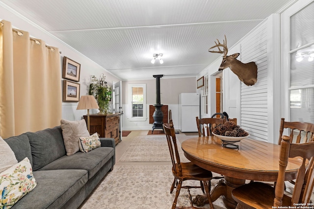 2 Fm 289, Comfort, TX 78013 - dining area with crown molding and a wood stove