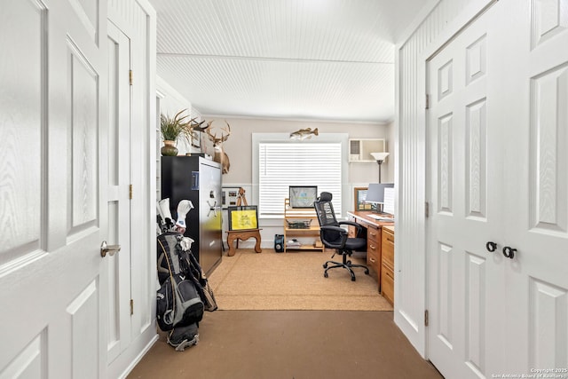 2 Fm 289, Comfort, TX 78013 - office featuring crown molding, a wall mounted AC, carpet floors, and concrete flooring