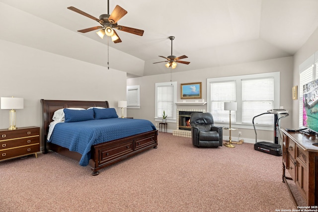 2 Fm 289, Comfort, TX 78013 - carpeted bedroom with lofted ceiling, multiple windows, a glass covered fireplace, and ceiling fan