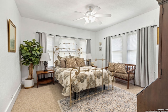 2 Fm 289, Comfort, TX 78013 - carpeted bedroom featuring baseboards and ceiling fan