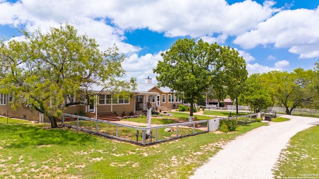 2 Fm 289, Comfort, TX 78013 - view of front facade with a chimney and a metal roof