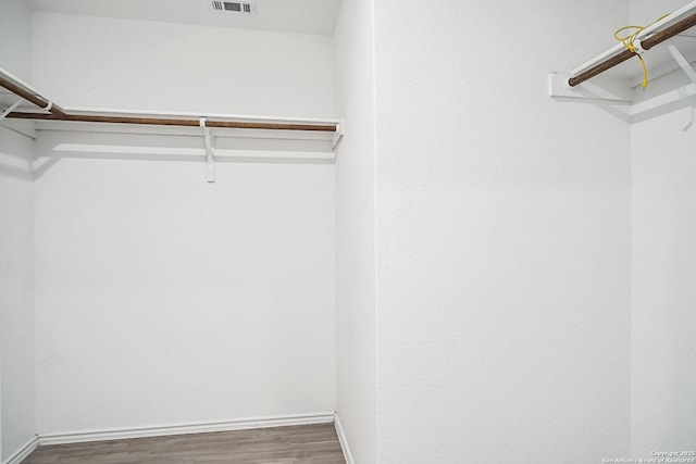 7002 Satellite, San Antonio, TX 78252 - spacious closet featuring wood finished floors