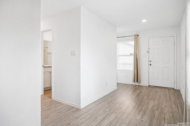 7002 Satellite, San Antonio, TX 78252 - entryway featuring light wood finished floors and recessed lighting
