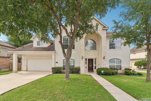 1810 Three Frks, San Antonio, TX 78258 - view of front of house with driveway, a front lawn, stone siding, and a shingled roof