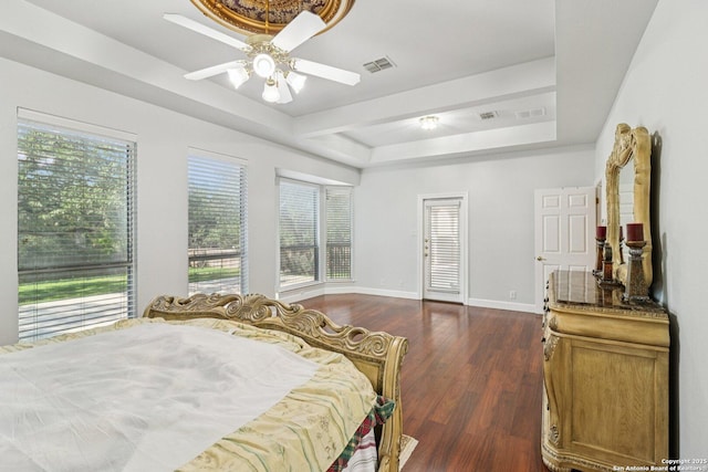 1810 Three Frks, San Antonio, TX 78258 - bedroom with a tray ceiling, dark wood finished floors, and ceiling fan
