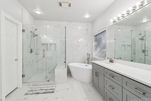 1810 Three Frks, San Antonio, TX 78258 - bathroom with a marble finish shower, vanity, marble finish floors, and a freestanding bath