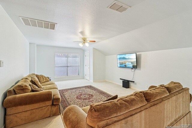 1810 Three Frks, San Antonio, TX 78258 - living room featuring light colored carpet, a ceiling fan, and vaulted ceiling