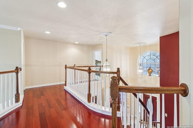 1810 Three Frks, San Antonio, TX 78258 - corridor with an upstairs landing, wood-type flooring, and recessed lighting