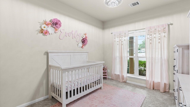 21810 Thunder Basin, San Antonio, TX 78261 - bedroom featuring a crib and light carpet