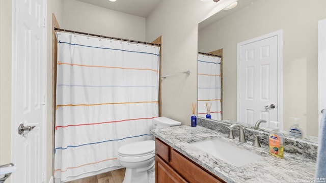 21810 Thunder Basin, San Antonio, TX 78261 - full bathroom featuring vanity, wood finished floors, and a shower with curtain