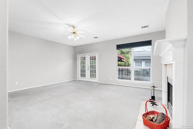 4481 Owl Crk, Schertz, TX 78154 - unfurnished living room with a fireplace, ceiling fan, french doors, and carpet floors