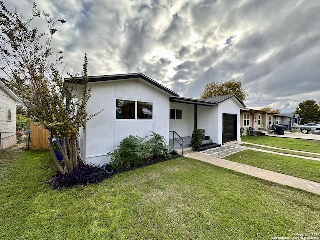 414 Clower, San Antonio, TX 78212 - view of front facade featuring a garage, stucco siding, and driveway