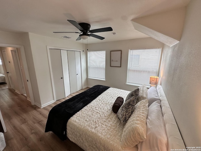 414 Clower, San Antonio, TX 78212 - bedroom with wood finished floors, a closet, and a ceiling fan