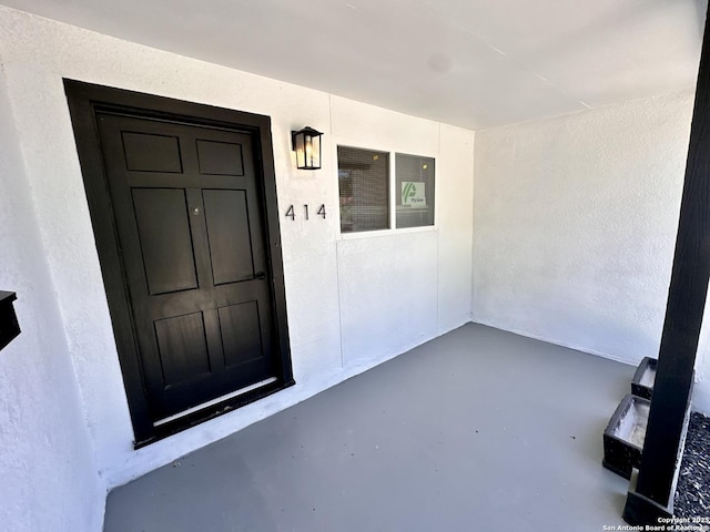 414 Clower, San Antonio, TX 78212 - property entrance with stucco siding