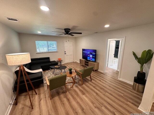 414 Clower, San Antonio, TX 78212 - living room featuring light wood finished floors, recessed lighting, and ceiling fan