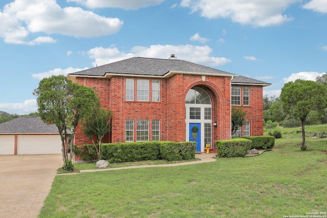 23613 Grayling Ln, San Antonio, TX 78259 - traditional home with brick siding, a front lawn, a garage, and concrete driveway