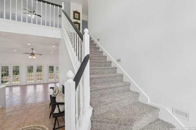 23613 Grayling Ln, San Antonio, TX 78259 - stairway featuring a ceiling fan, a high ceiling, tile patterned floors, and recessed lighting