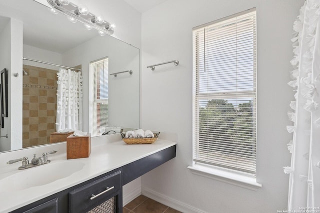 23613 Grayling Ln, San Antonio, TX 78259 - bathroom featuring vanity, healthy amount of natural light, tile patterned floors, and a shower with shower curtain