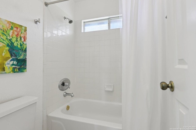 23613 Grayling Ln, San Antonio, TX 78259 - bathroom featuring shower / bath combo with shower curtain and toilet