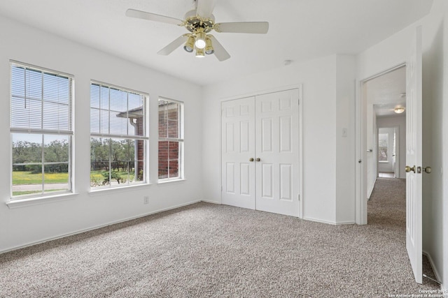 23613 Grayling Ln, San Antonio, TX 78259 - unfurnished bedroom with carpet flooring, a closet, and a ceiling fan