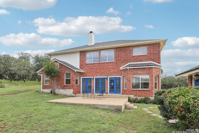 23613 Grayling Ln, San Antonio, TX 78259 - back of property with brick siding, a patio area, and a lawn