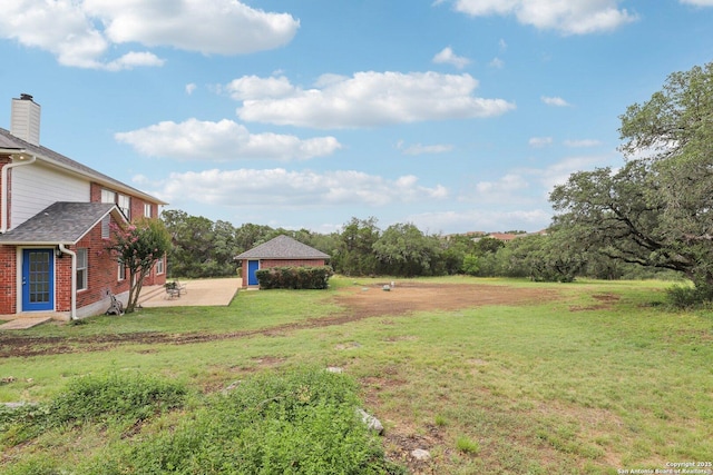 23613 Grayling Ln, San Antonio, TX 78259 - view of green lawn with a patio